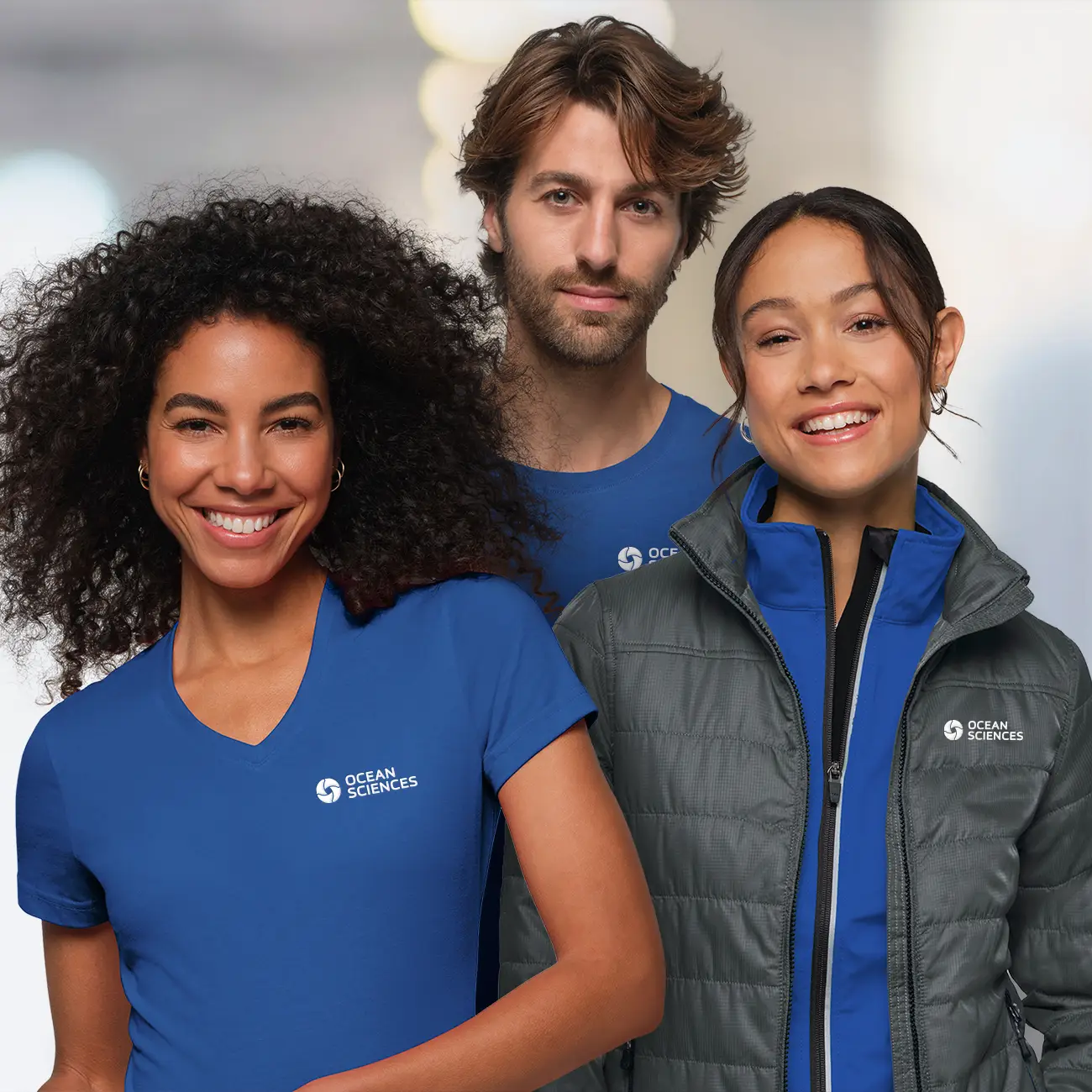 3 Mitarbeitende in moderner zeitgemäßer Corporate Teamwear